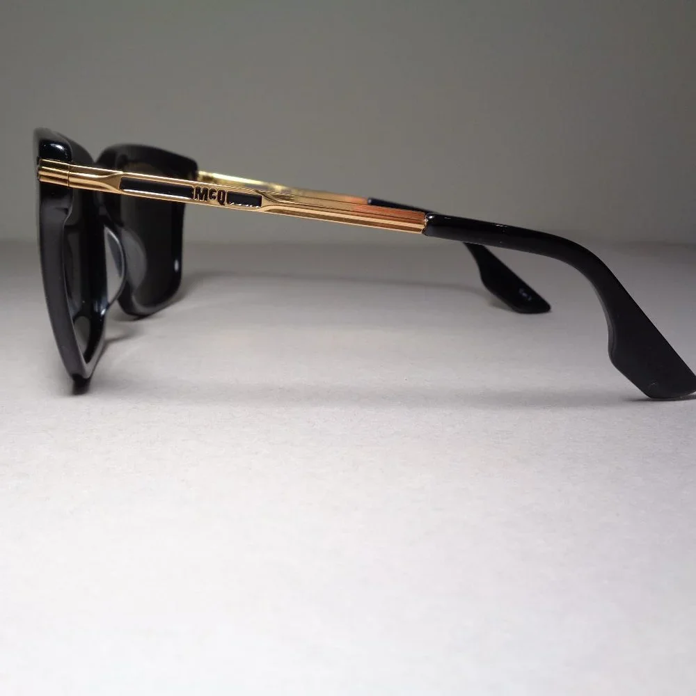 McQ by Alexander McQueen MQ0055S Black Gold New Men's Sunglasses